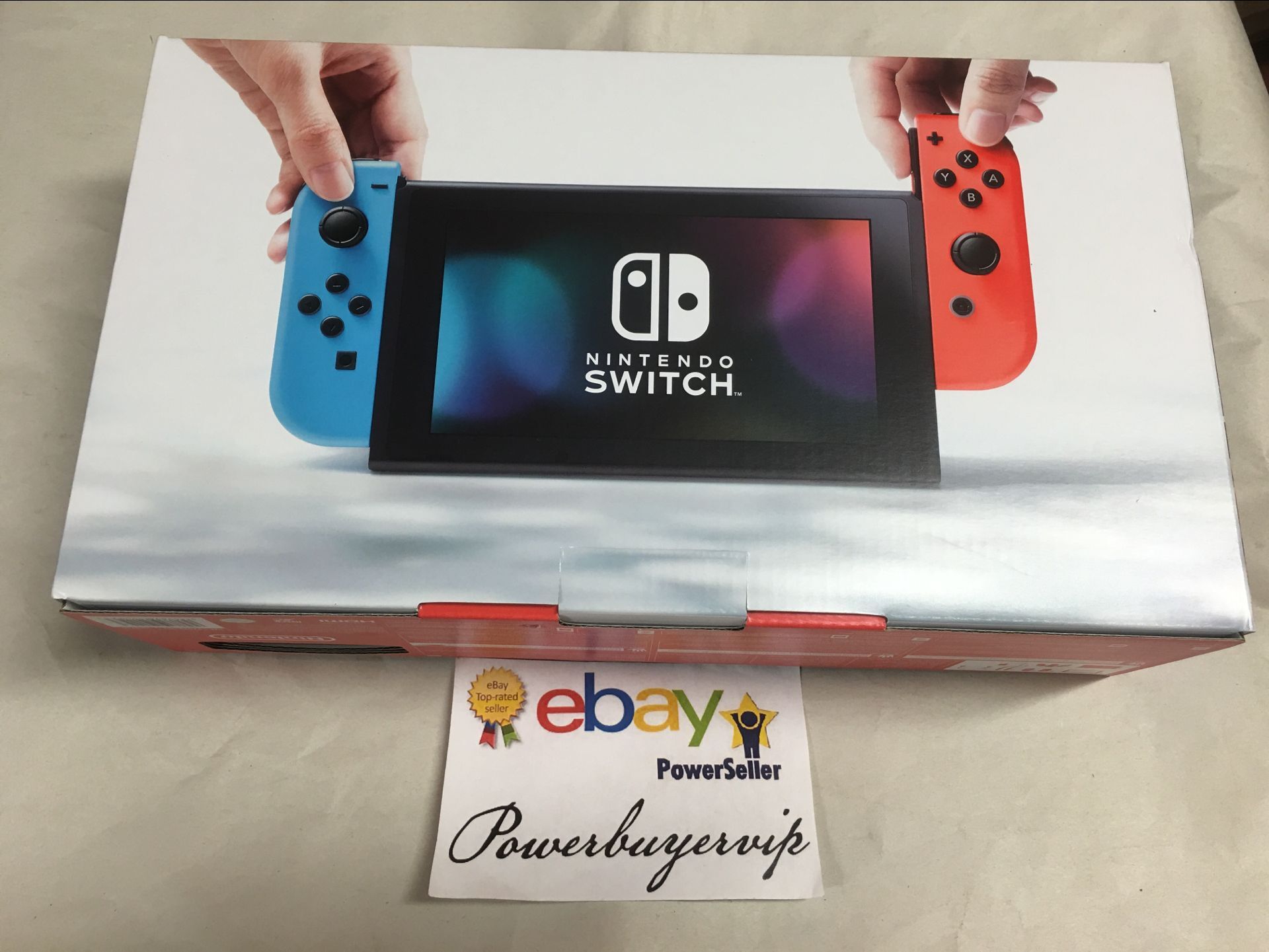 Nintendo Switch - 32GB Red Console (with Neon Red/Neon Blue Joy) - Click Image to Close